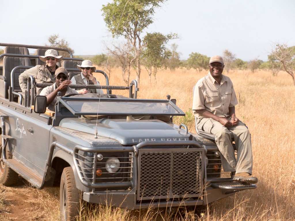 Oh right, that's why: wildlife in the national park is best explored by Land Rover.