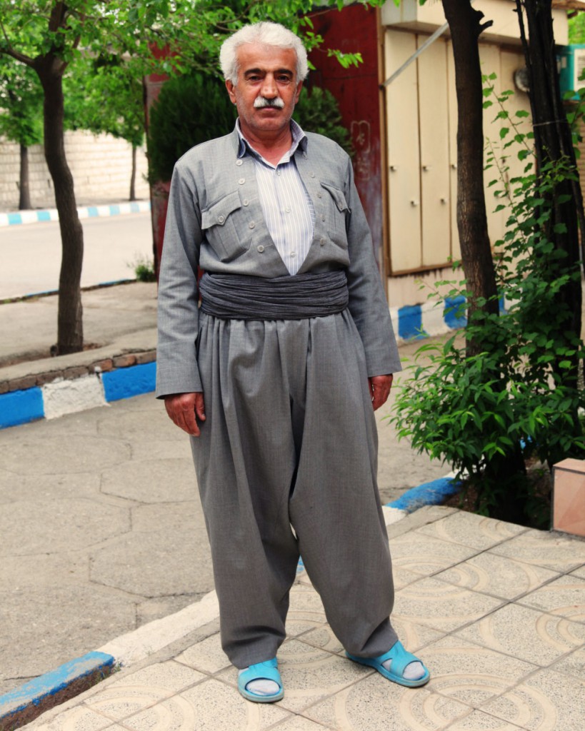 Kurdish traditional costume with rubber sandals: in the country's 